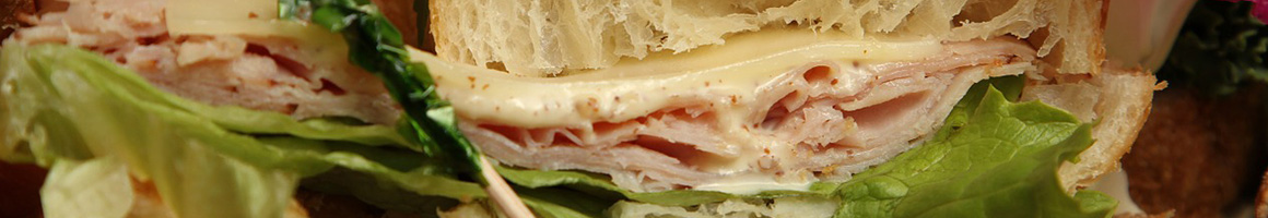 Eating Deli Sandwich at Lucchesi's Delicatessen restaurant in Petaluma, CA.